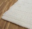 Belle finition résistante du tapis - ici en blanc naturel Belle finition résistante du tapis - ici en blanc naturel