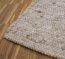 Belle finition résistante du tapis - ici en marron Belle finition résistante du tapis - ici en marron