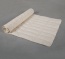 Dessus avec matelassage rectangulaire ingénieux afin que le tapis reste bien plat. Dessus avec matelassage rectangulaire ingénieux