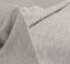 Bordure de la couverture d'appoint avec piqure décorative ton sur ton Gros plan sur la bordure à piqûre décorative en coloris beige
