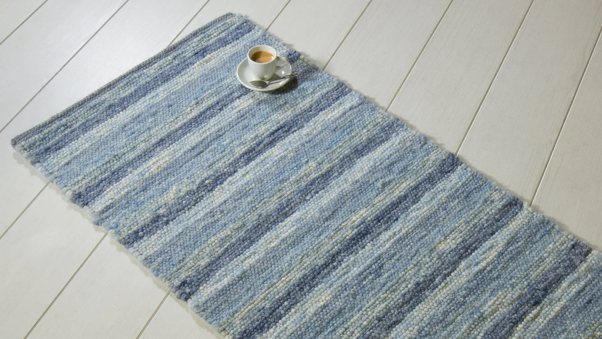 Tapis tissé à la main en 100 % laine vierge de mouton - ici en coloris bleu