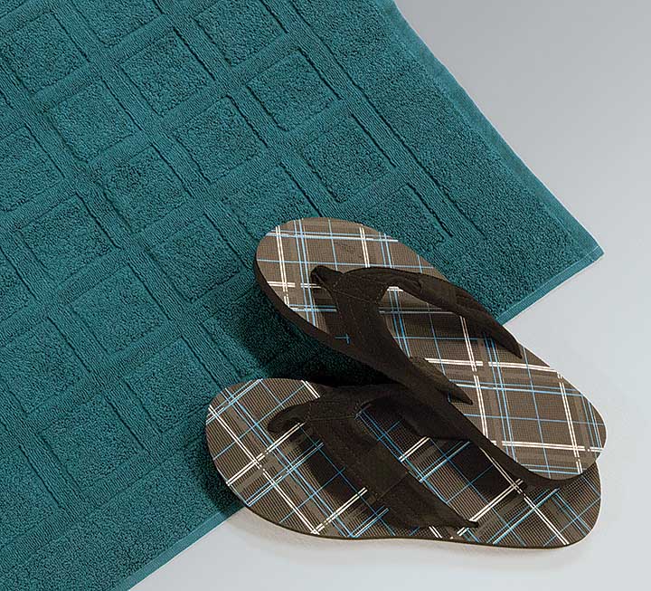 Tapis de bain au design classique - ici en coloris petrol Tapis de bain au design classique - ici en coloris petrol